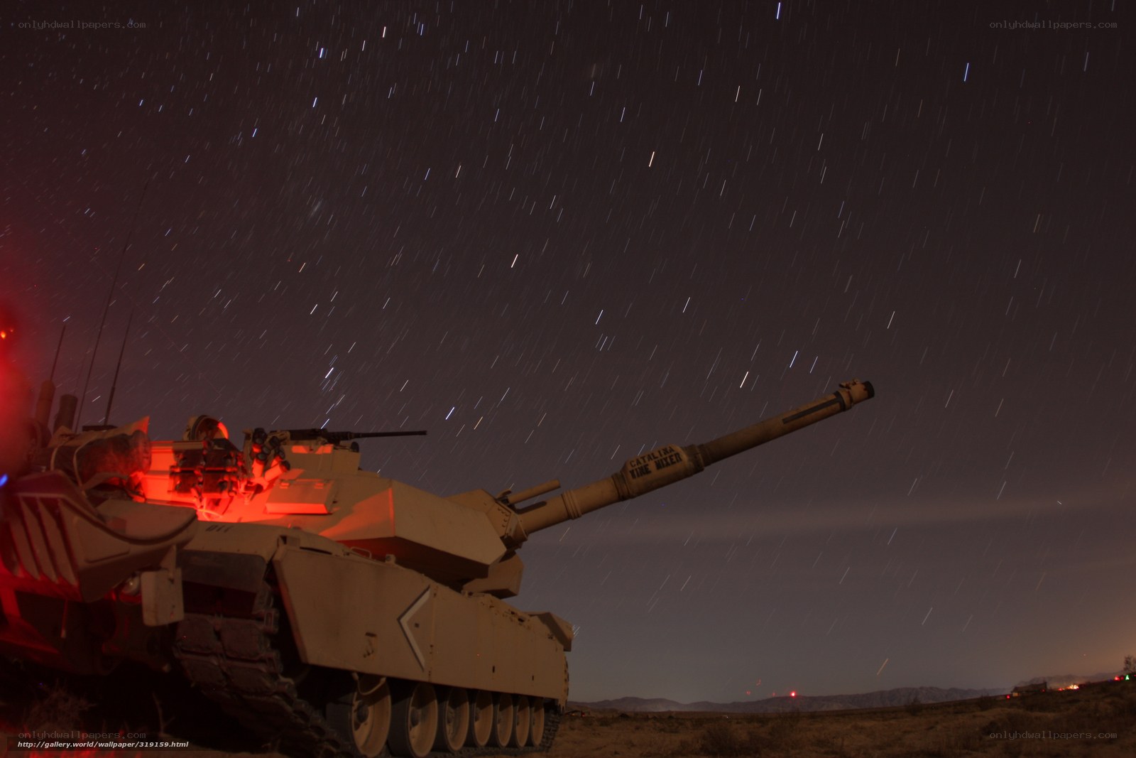 Tank under starry night sky