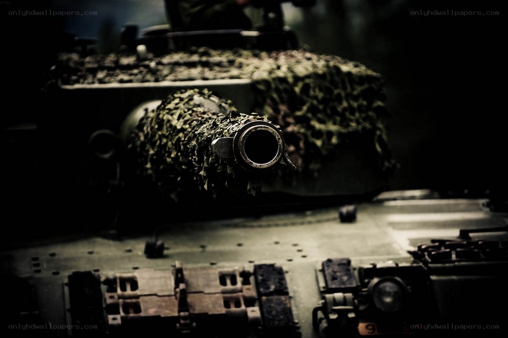 tank with camouflage netting