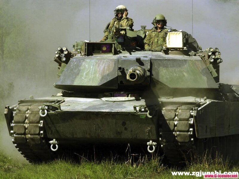 tank with soldiers in combat