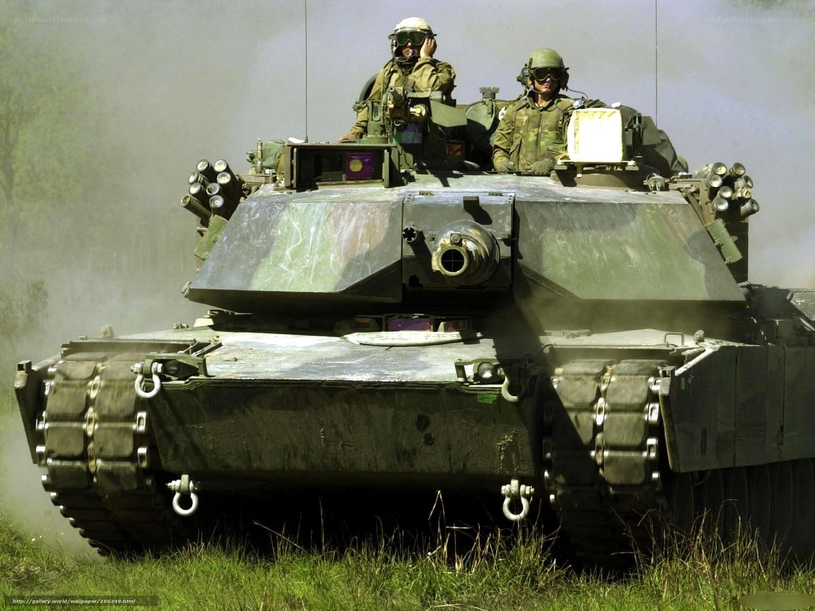 Tank with soldiers in combat
