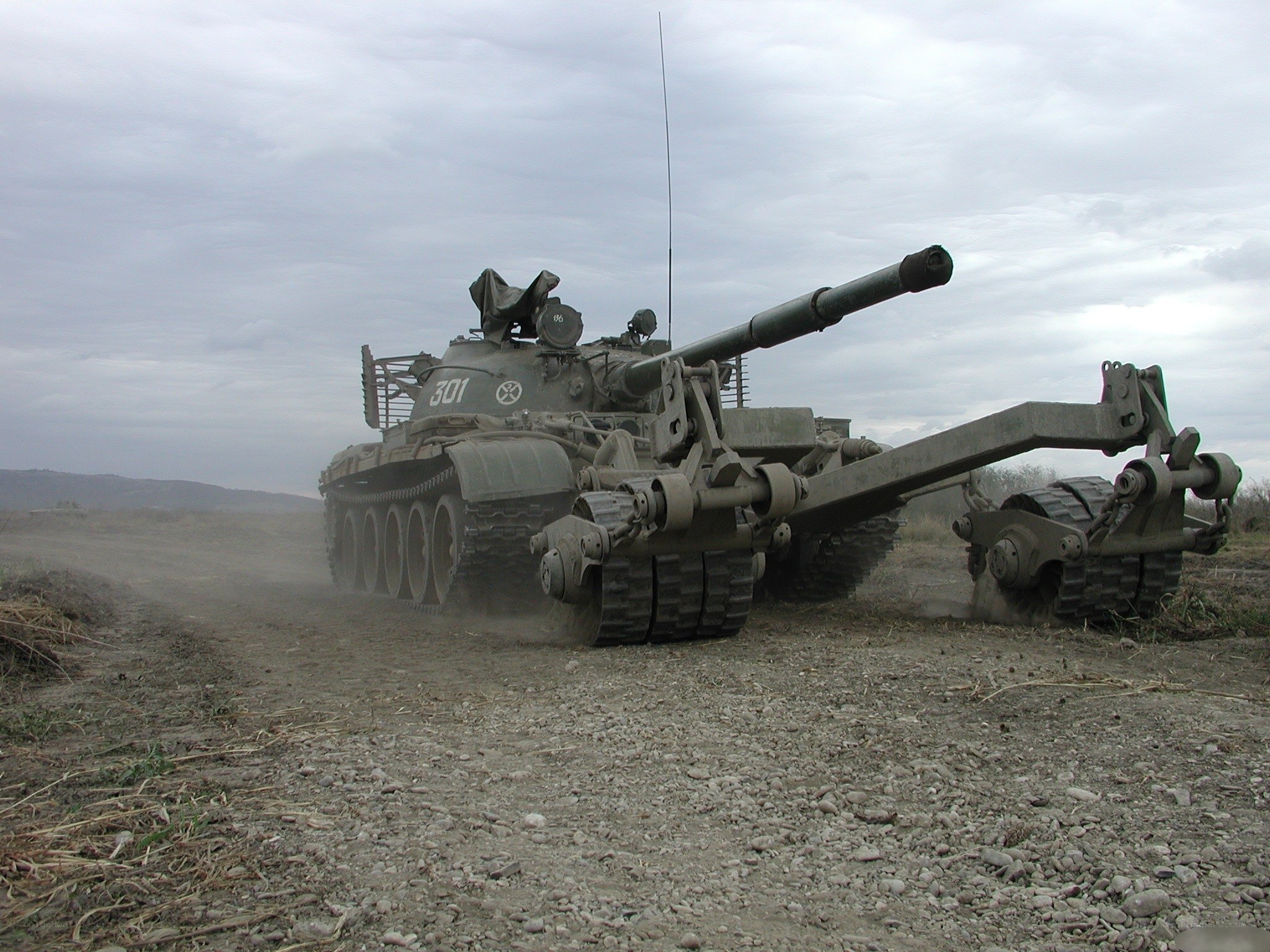 Tank with towing equipment