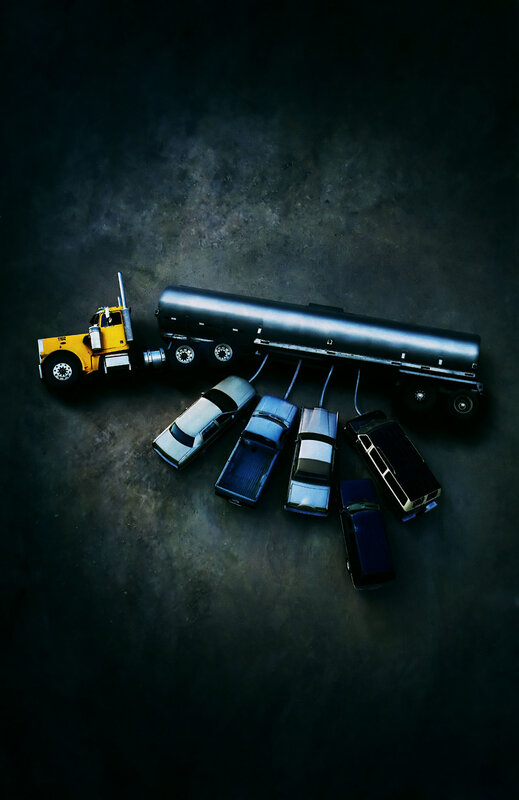 Tanker truck fueling cars