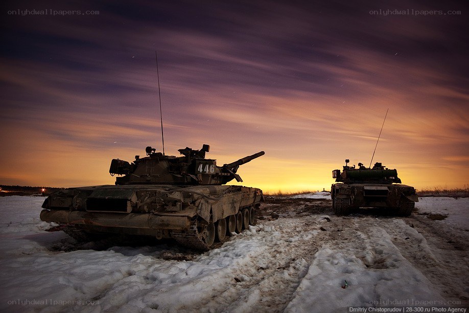 Tanks at sunset in snow