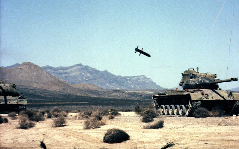 Tanks firing in desert