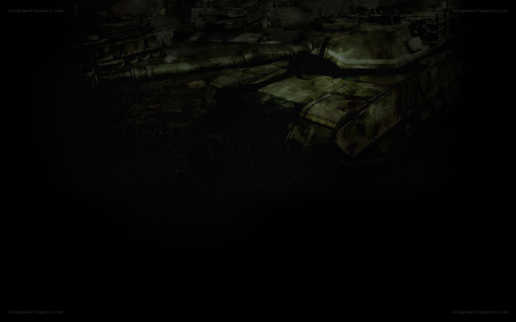 tanks in a dark hangar
