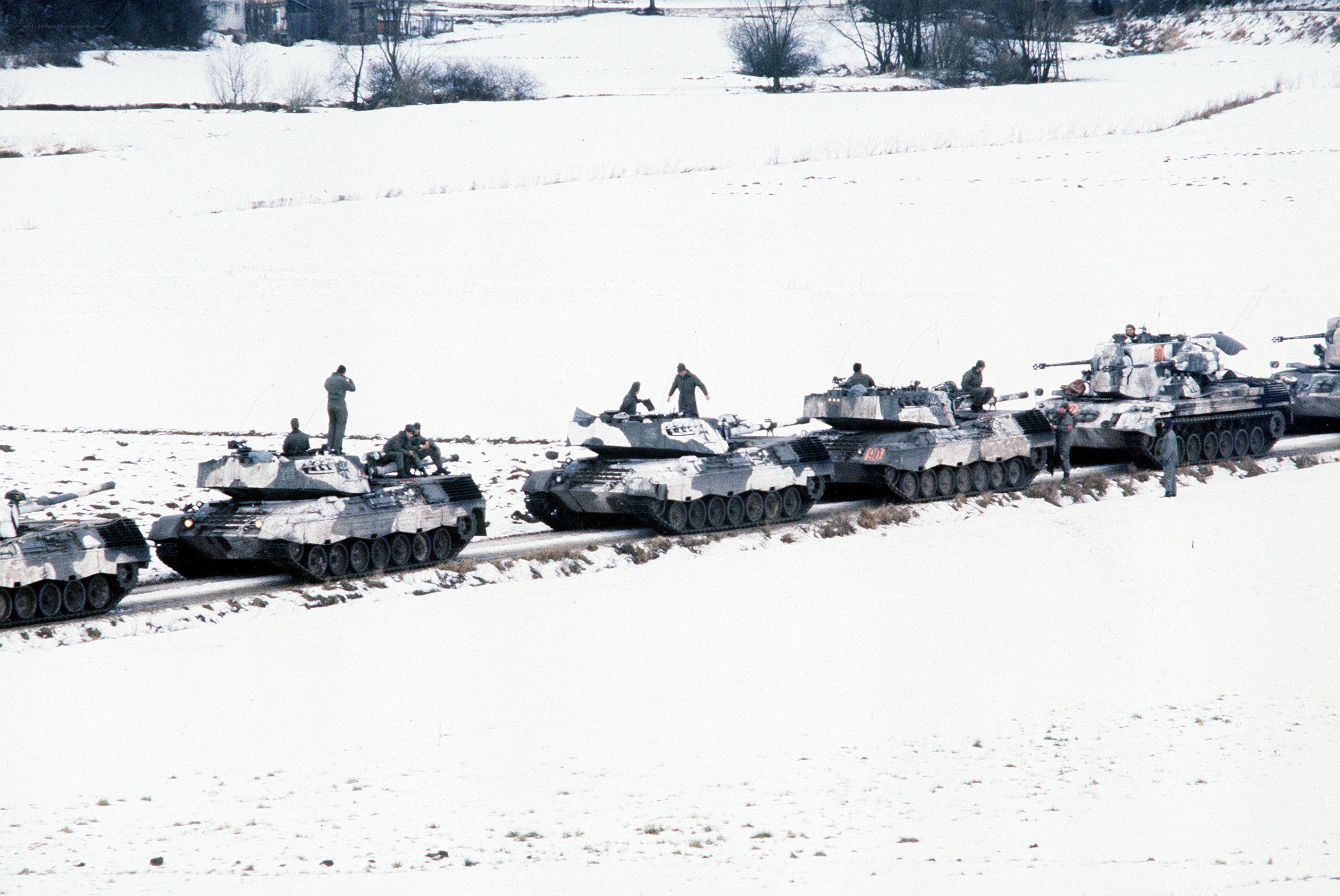 Tanks in a snowy field