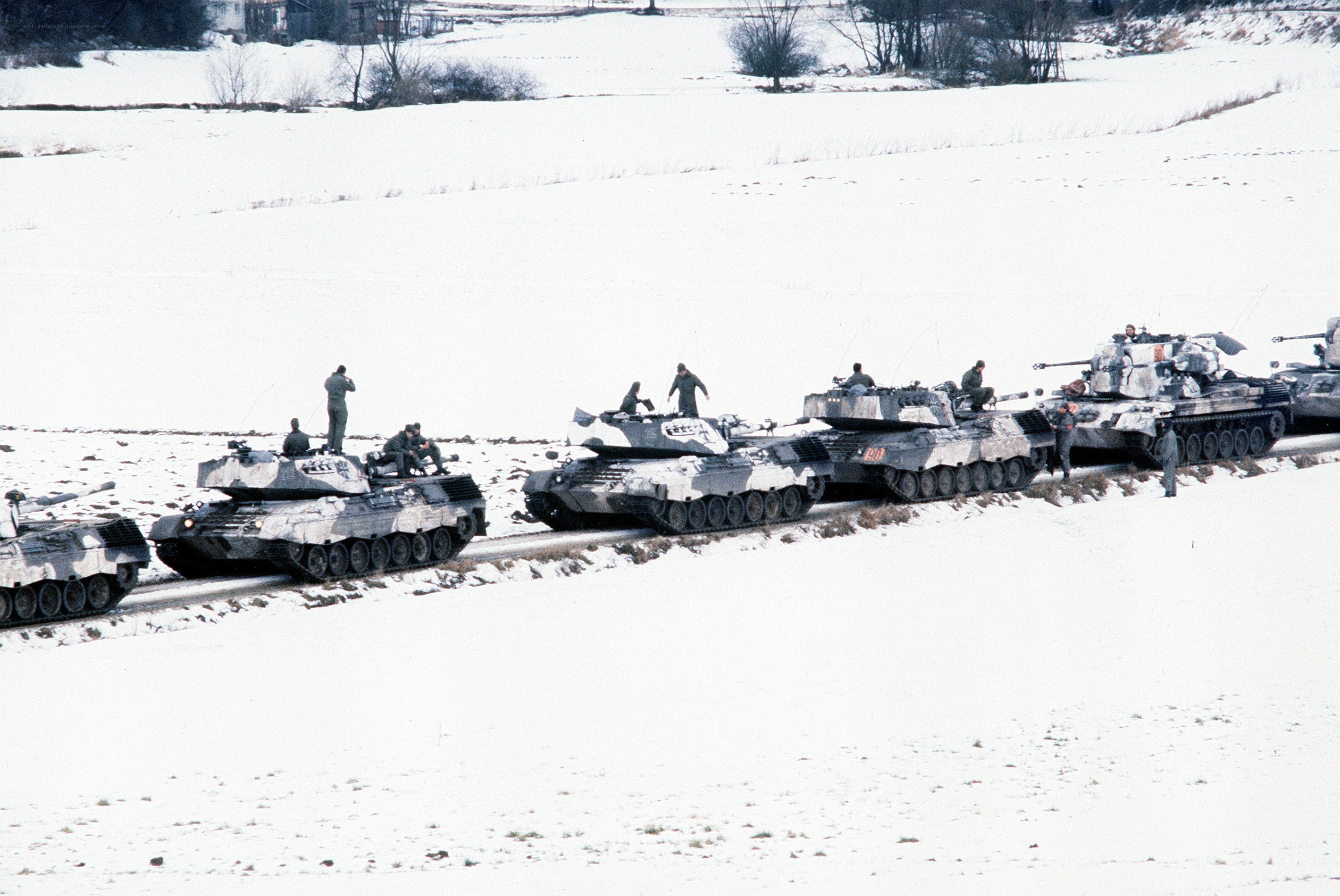 Tanks in a snowy field