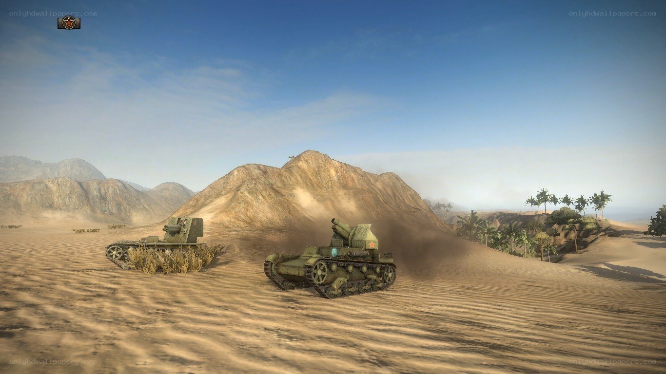 tanks in desert terrain
