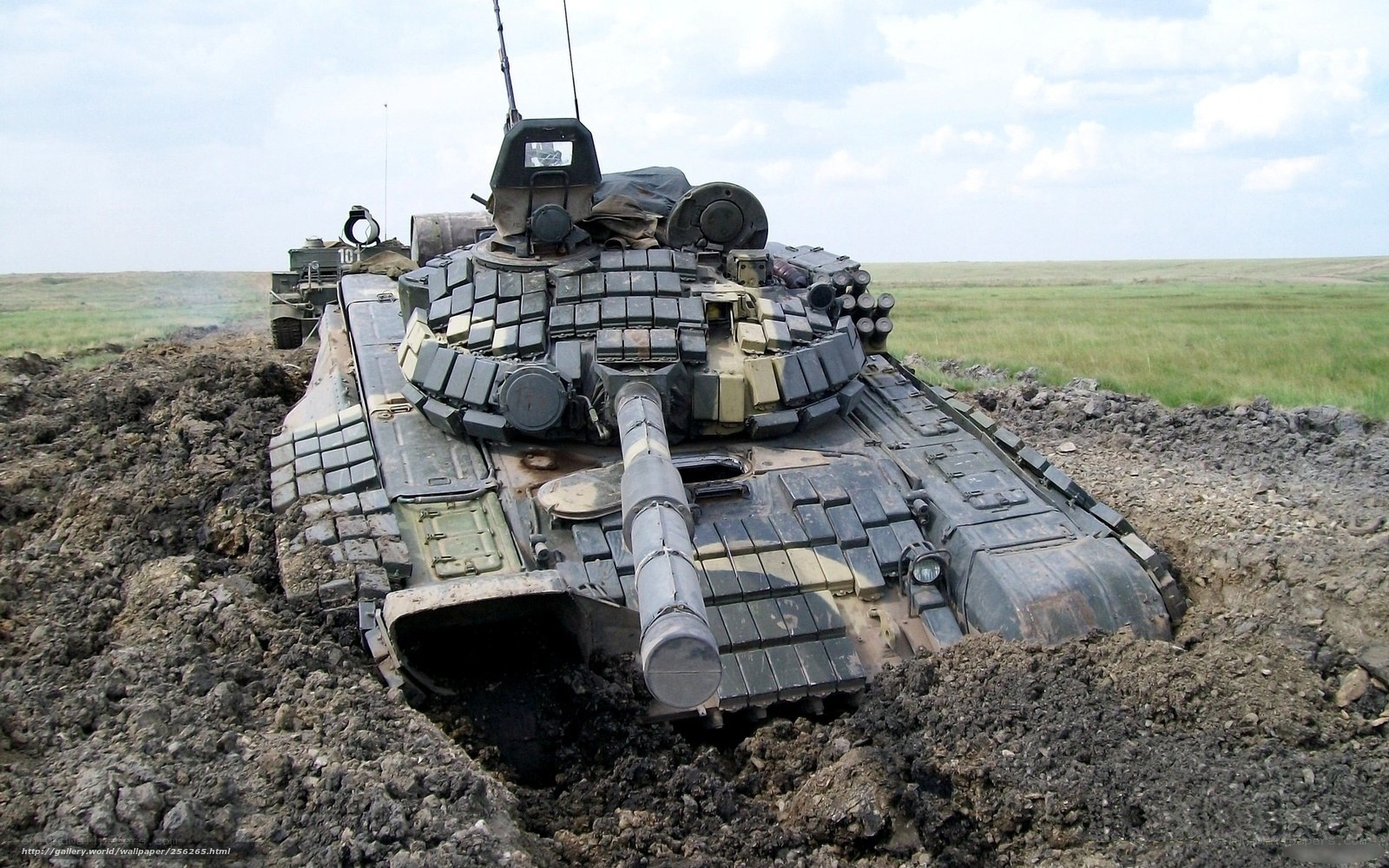 Tanks in muddy field