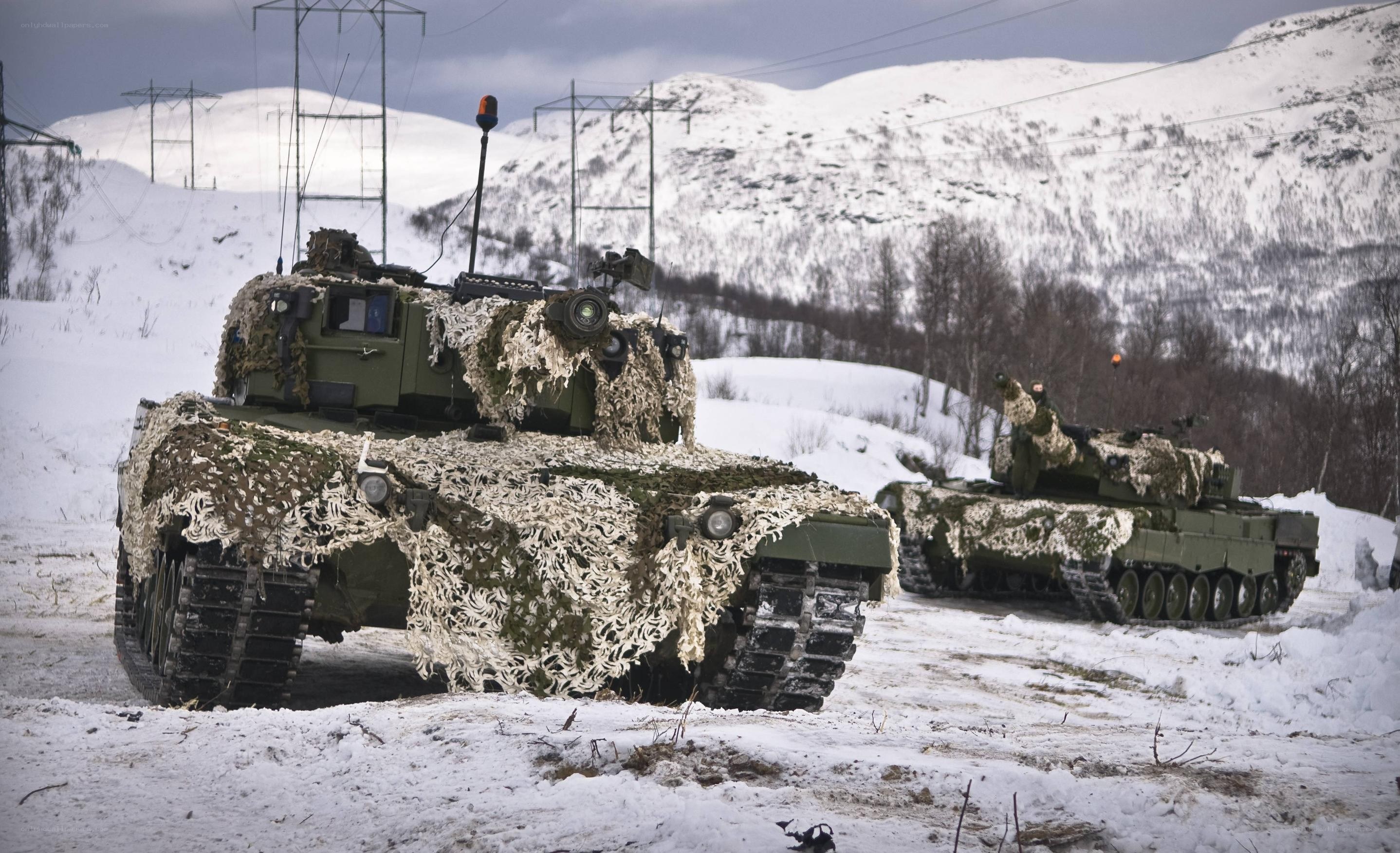 Tanks in snowy mountains