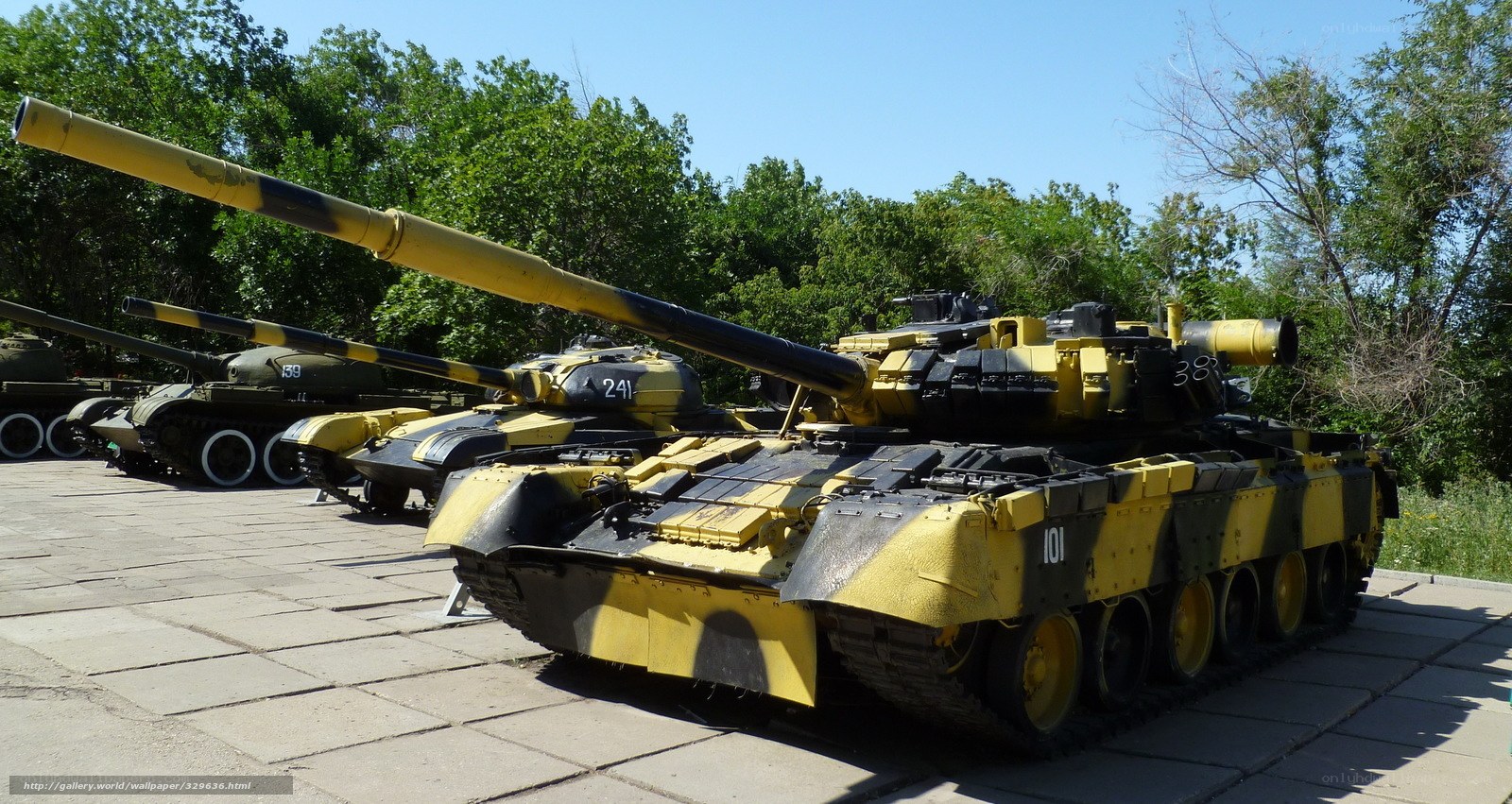 Tanks on display in a park