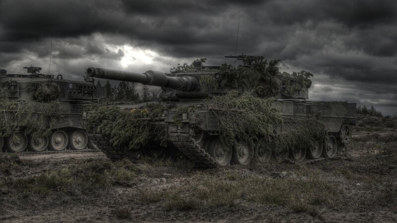 Tanks under a stormy sky