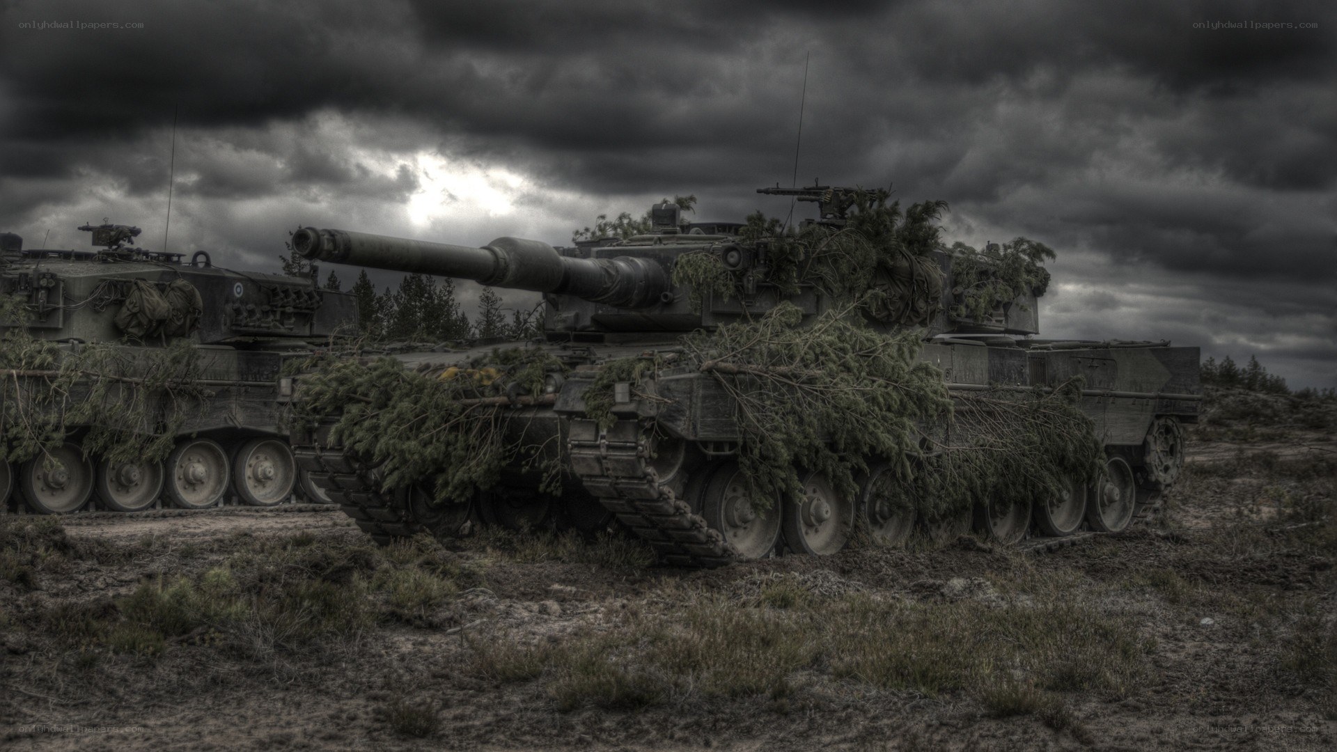 Tanks under a stormy sky