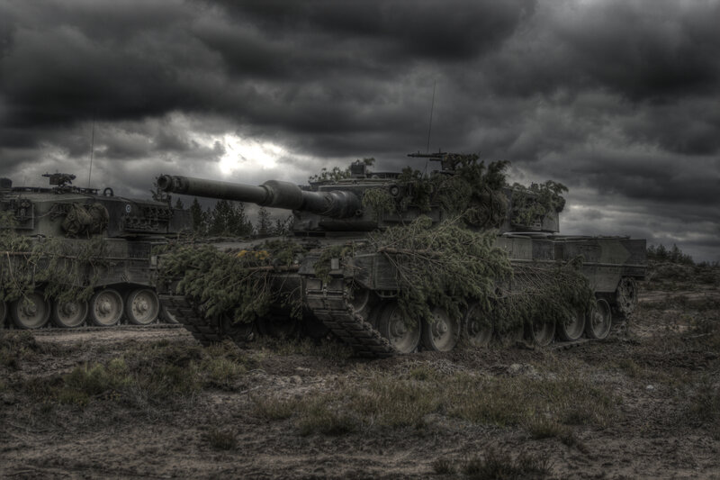 Tanks under stormy sky