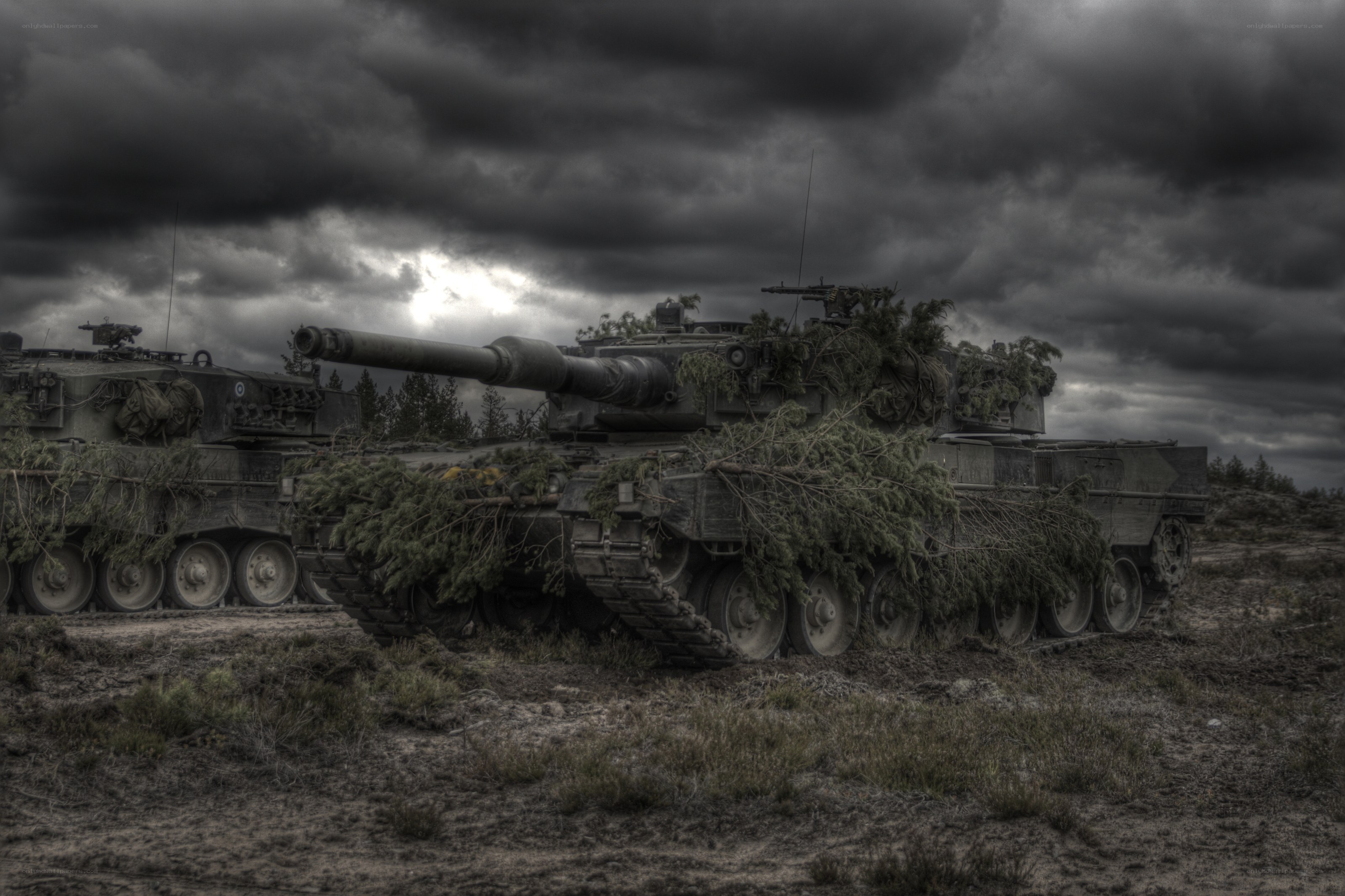Tanks under stormy sky