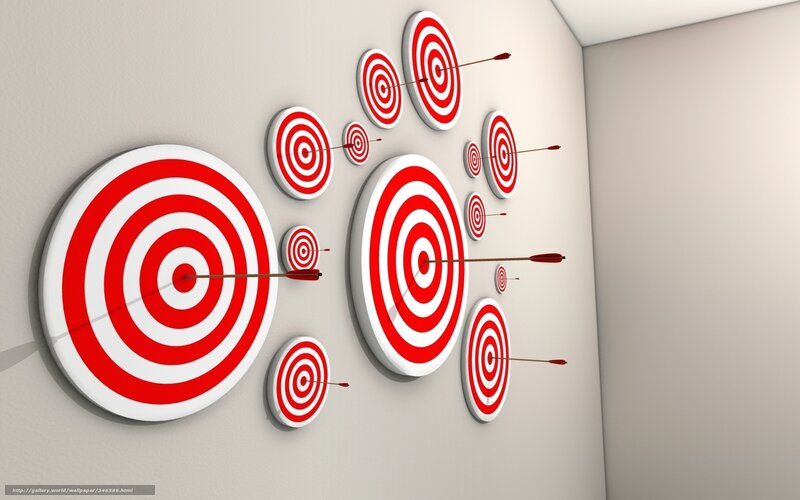 Targets with arrows on wall