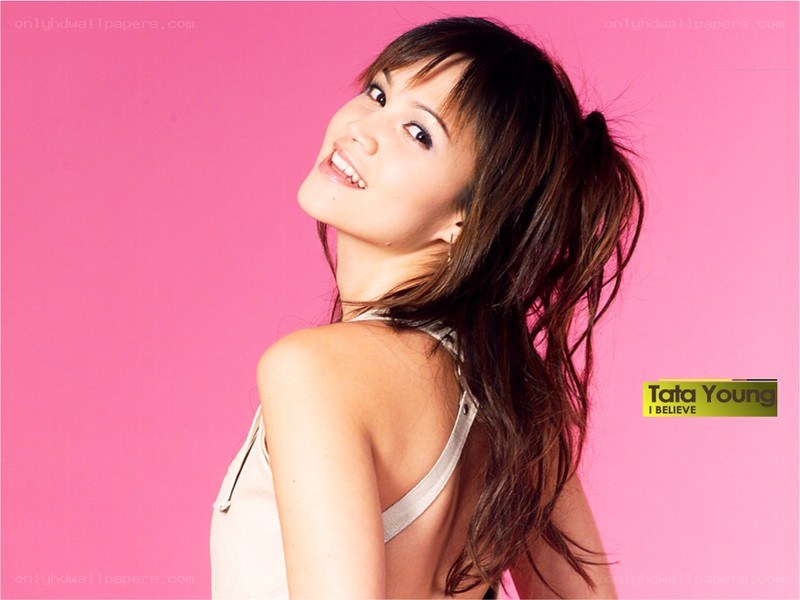 Tata Young smiling in pink