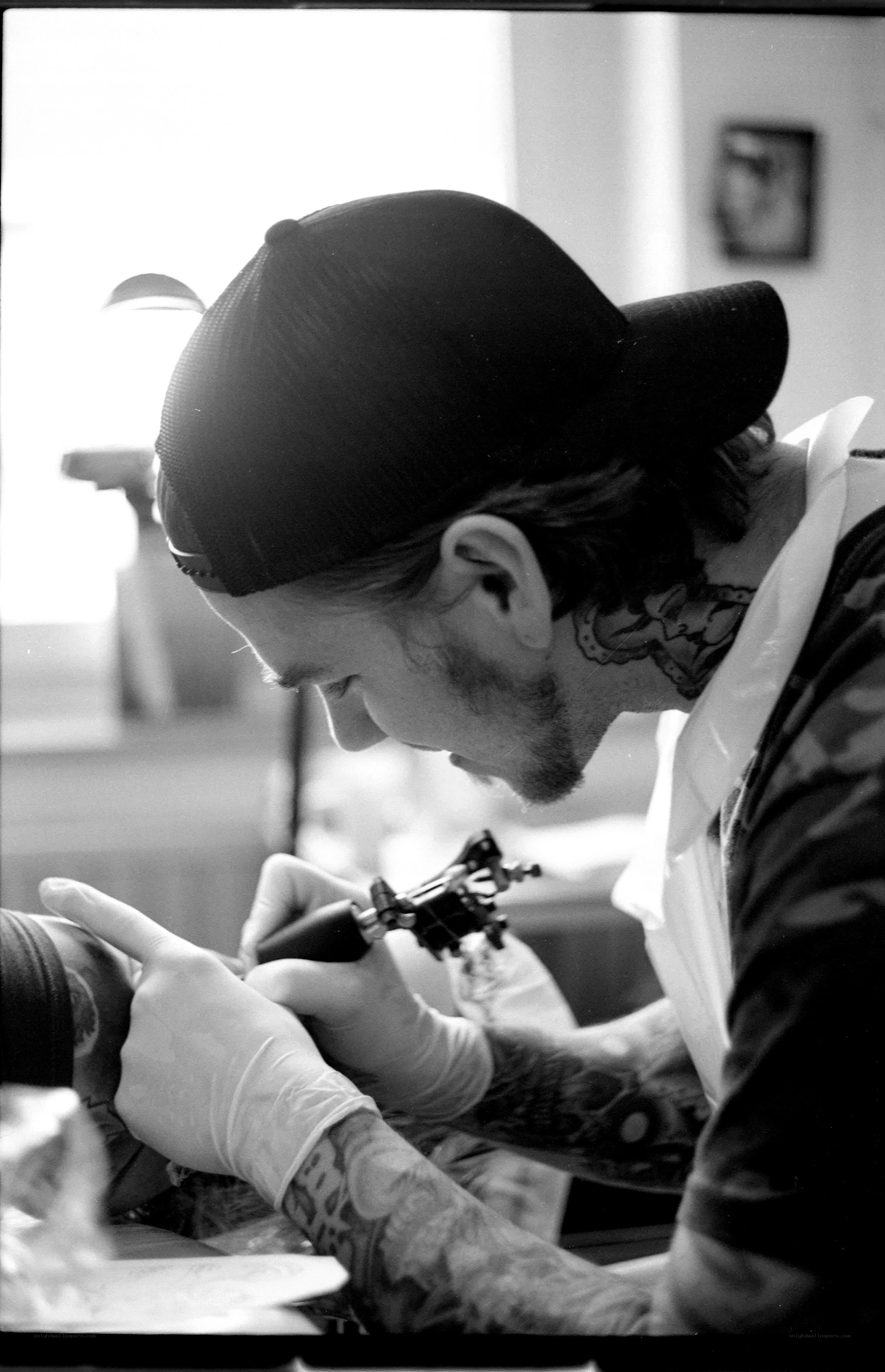 tattoo artist at work