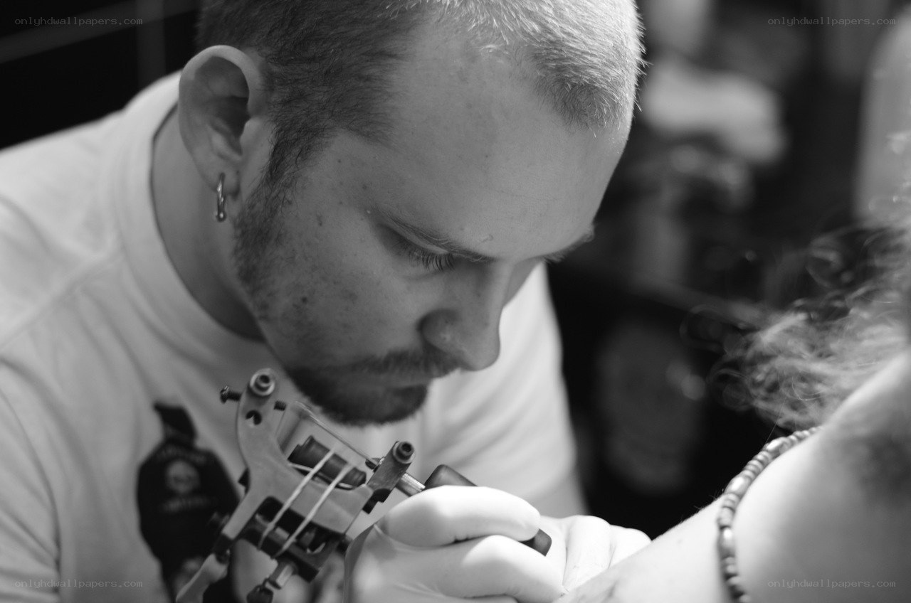 tattoo artist at work