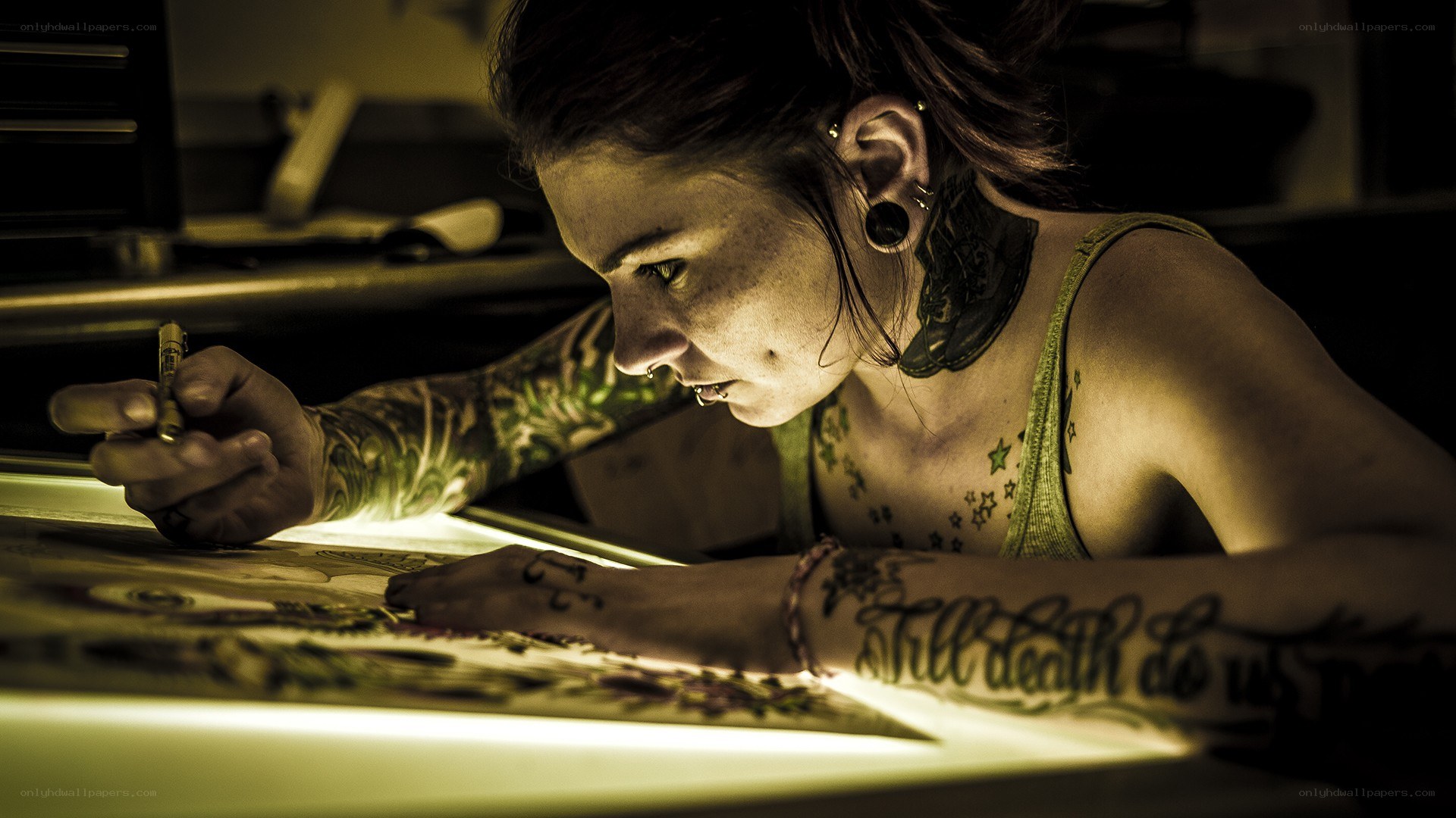 tattoo artist at work