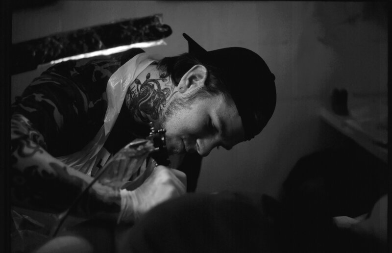 tattoo artist at work