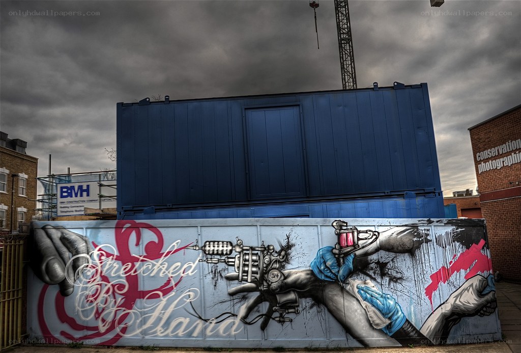 Tattoo Gun Mural on Wall