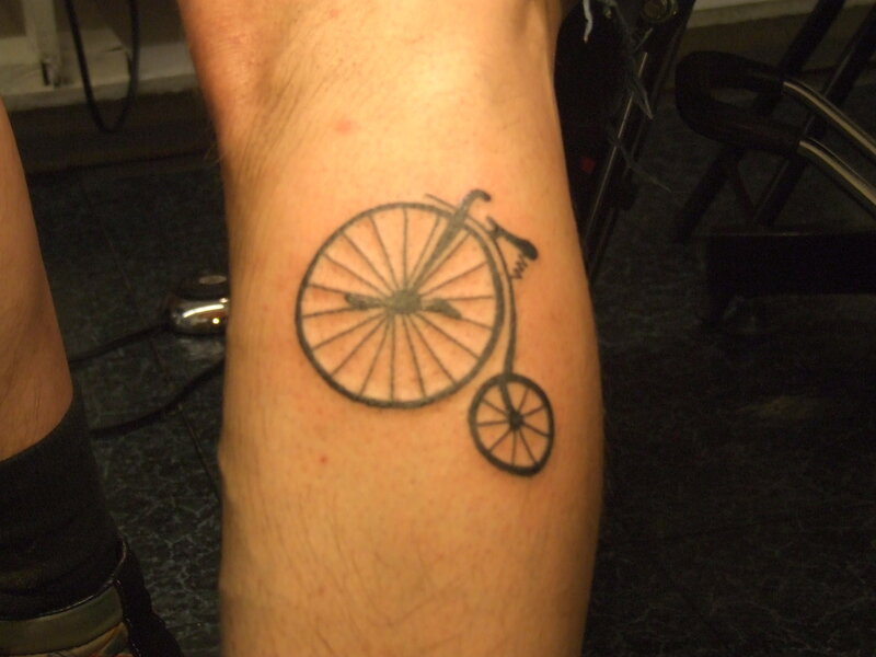 tattoo of a penny-farthing bicycle