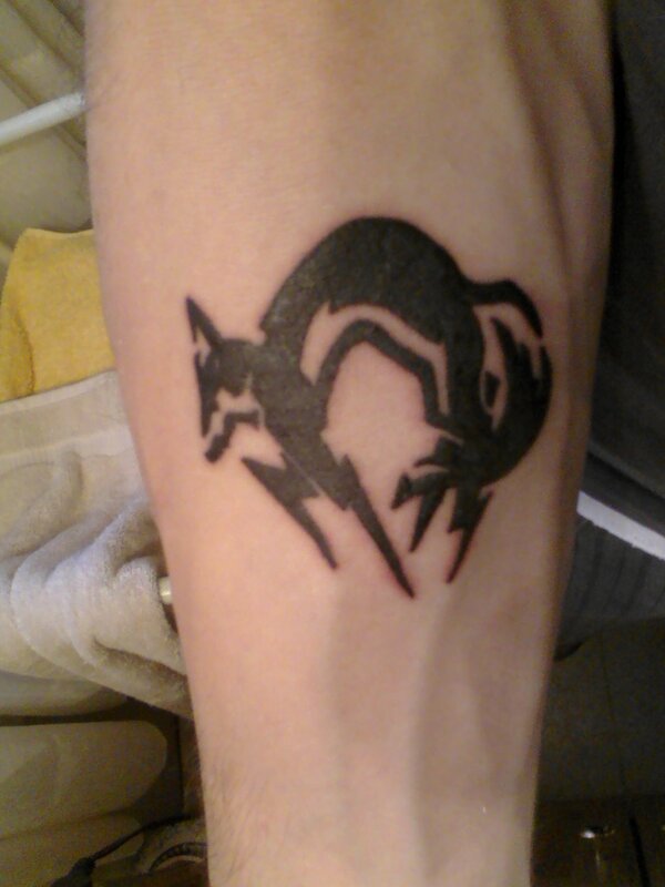 tattoo of stylized animal