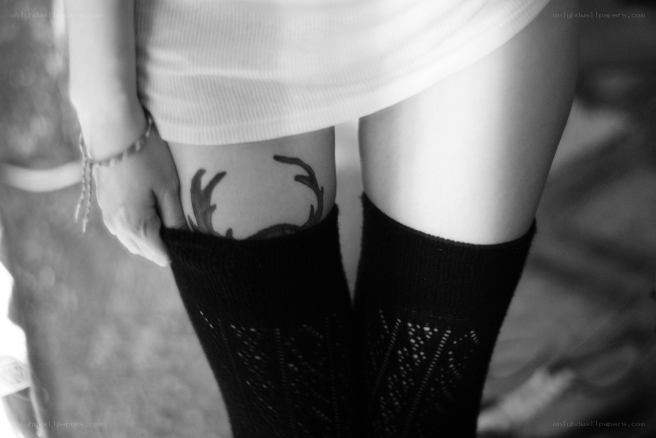 tattoo on thigh with socks