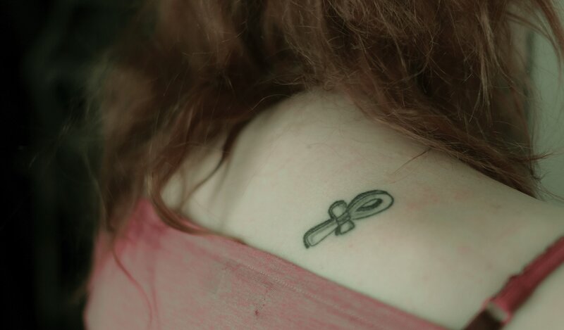 tattoo on woman's shoulder