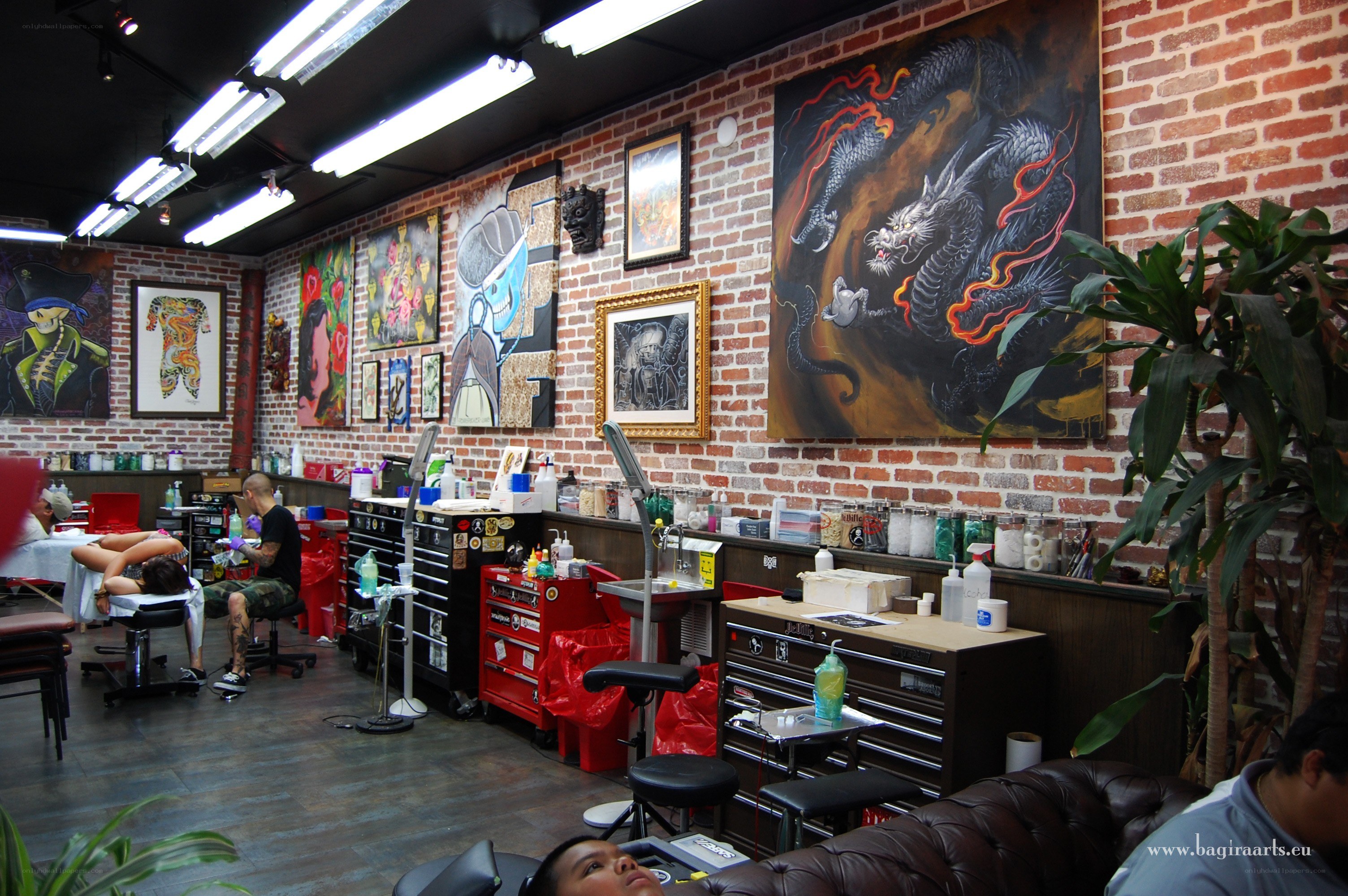 Tattoo parlor interior with artwork