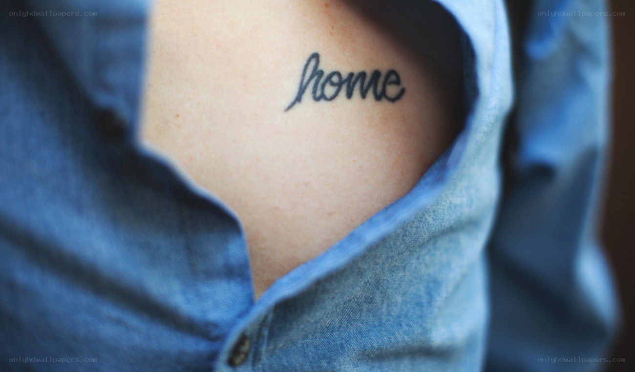 tattoo reading 'home'