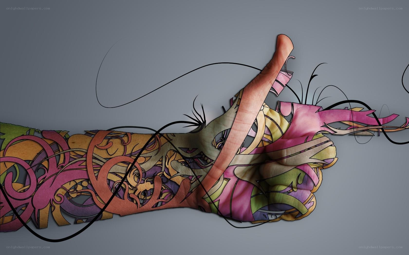 tattooed arm with abstract art