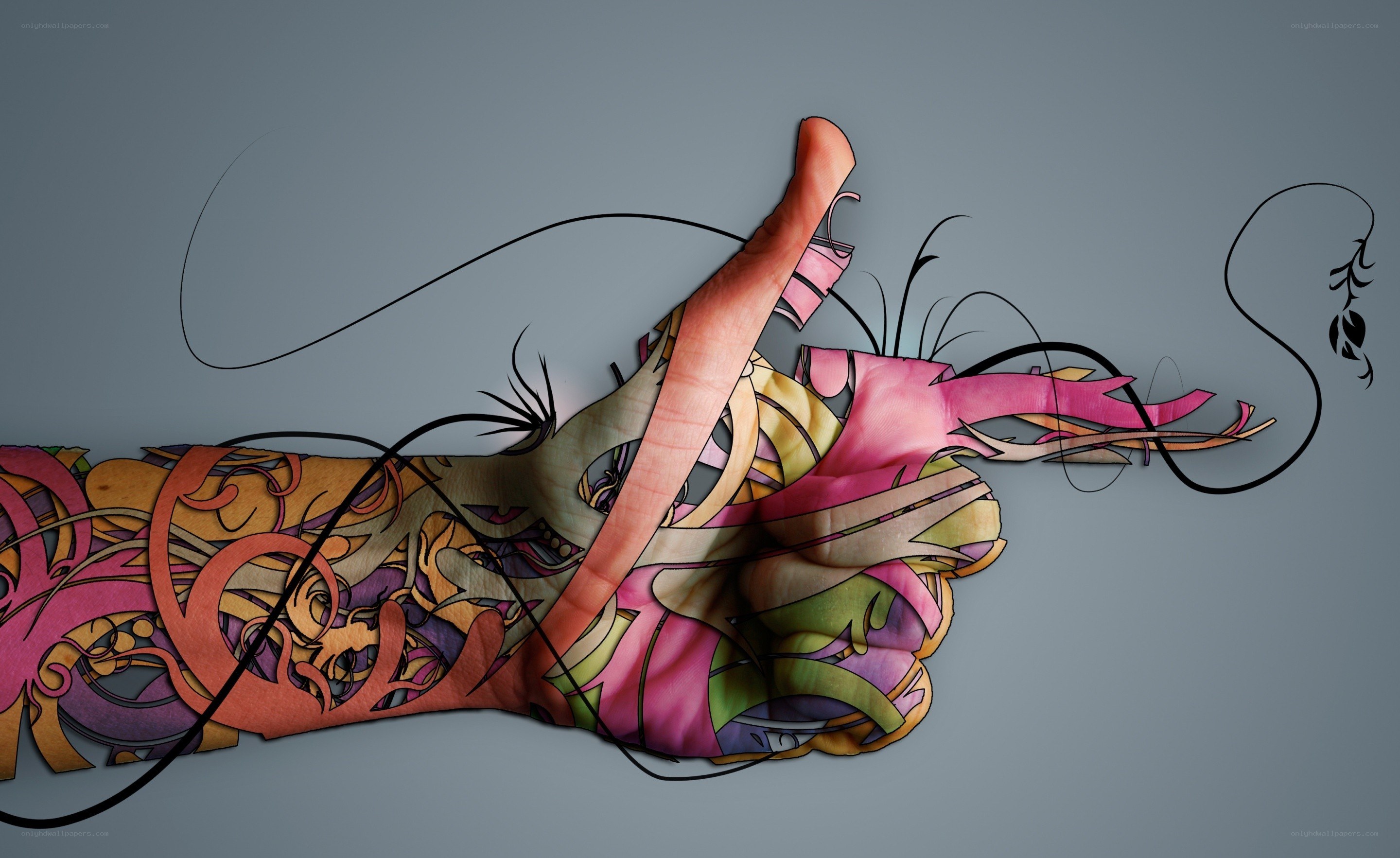 tattooed arm with abstract art