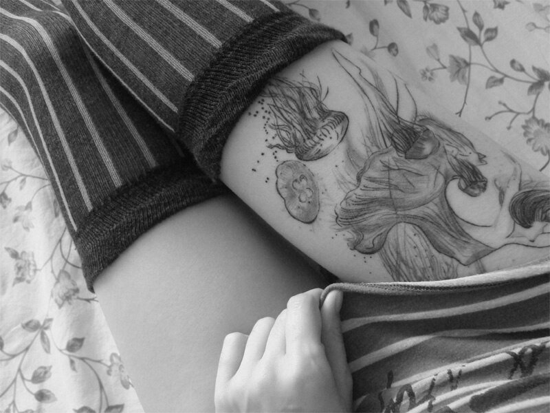 tattooed arm with jellyfish