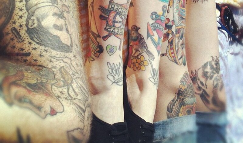 tattooed arms close-up
