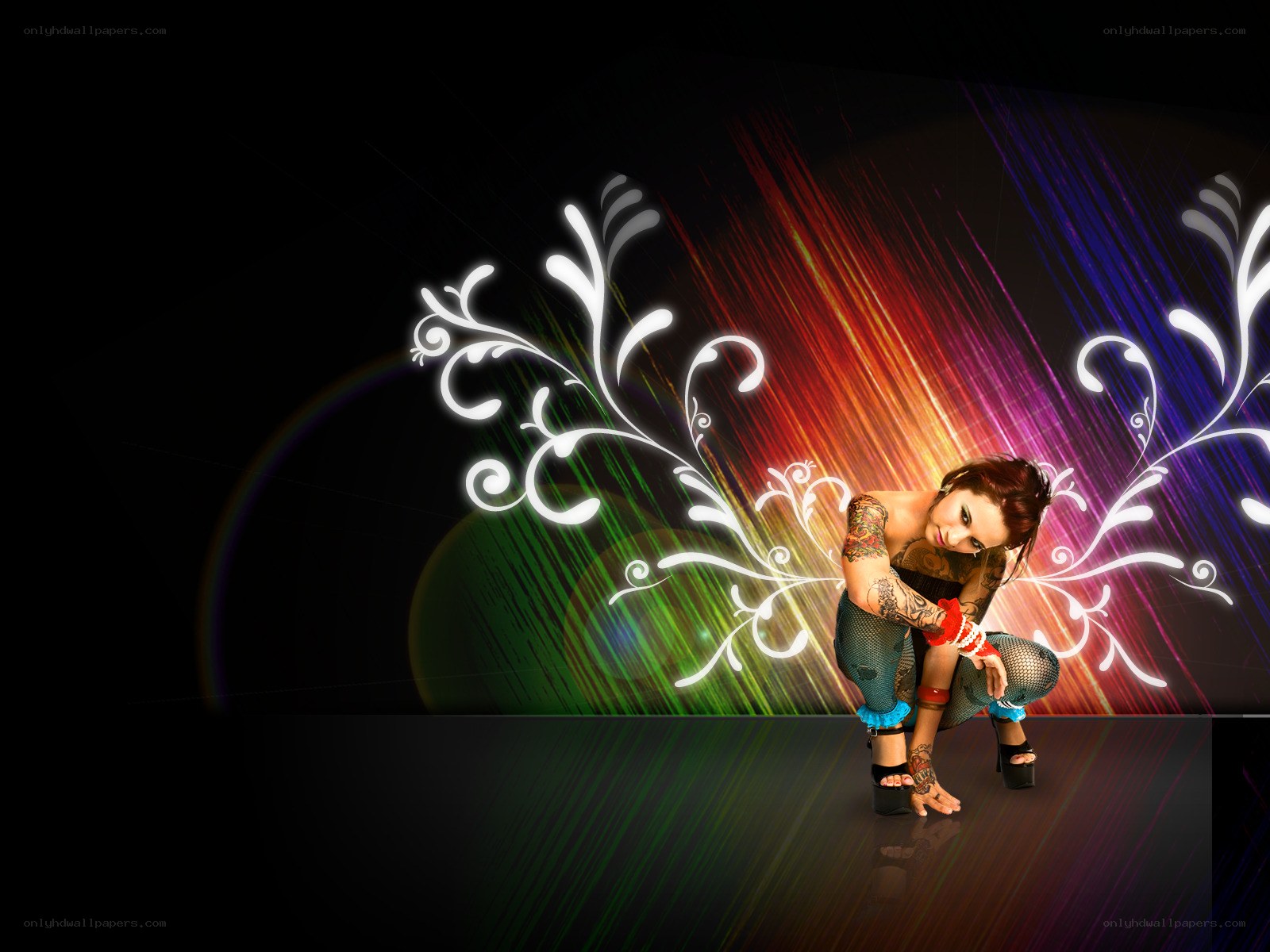 tattooed dancer with colorful lights