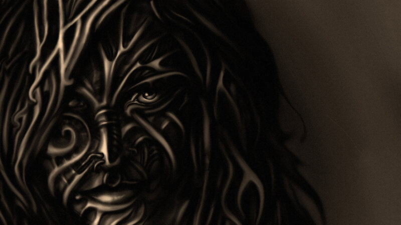 Tattooed Face with Dreadlocks