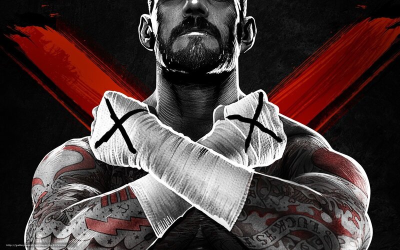 tattooed fighter with crossed arms