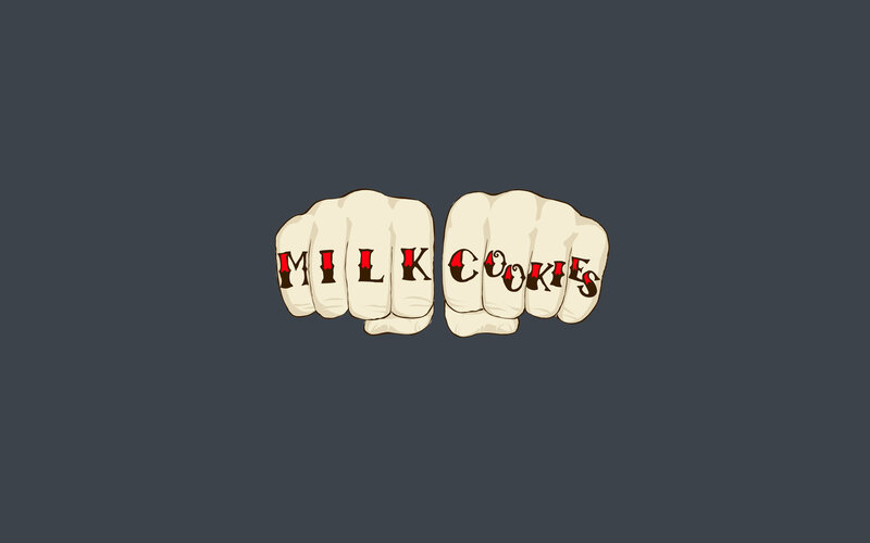 tattooed fists with milk cookies