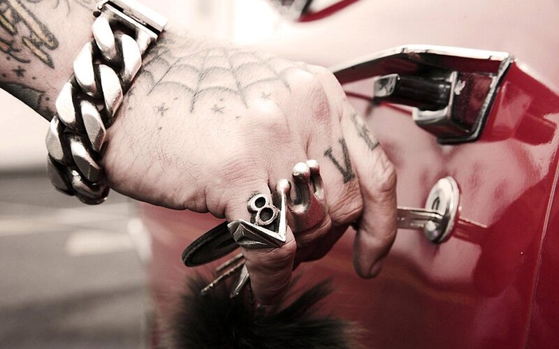 tattooed hand with keys