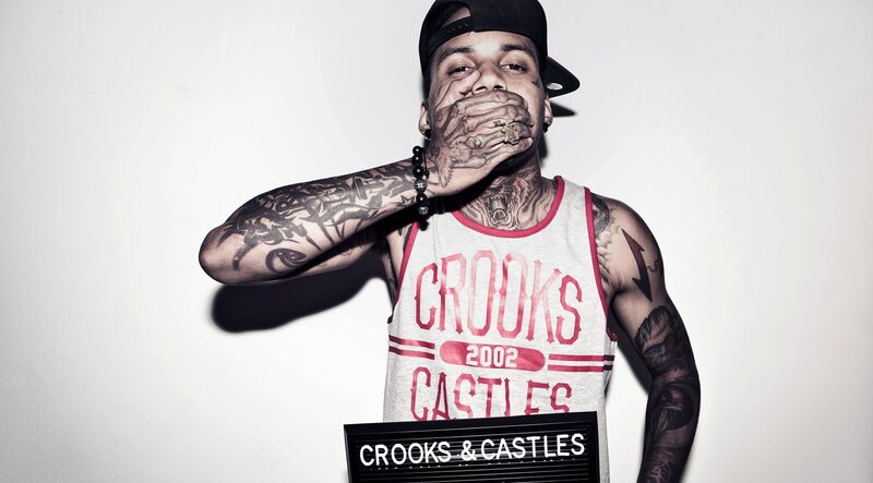tattooed man in crooks & castles