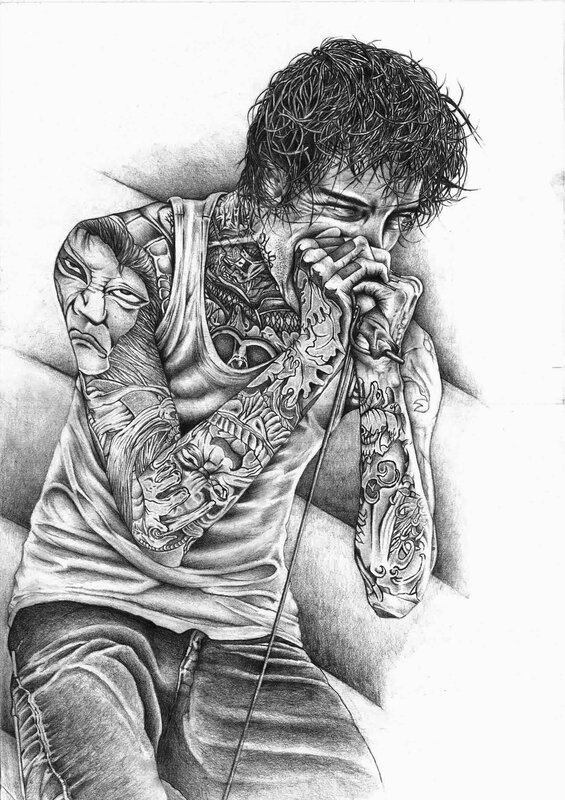 Tattooed Man on Couch