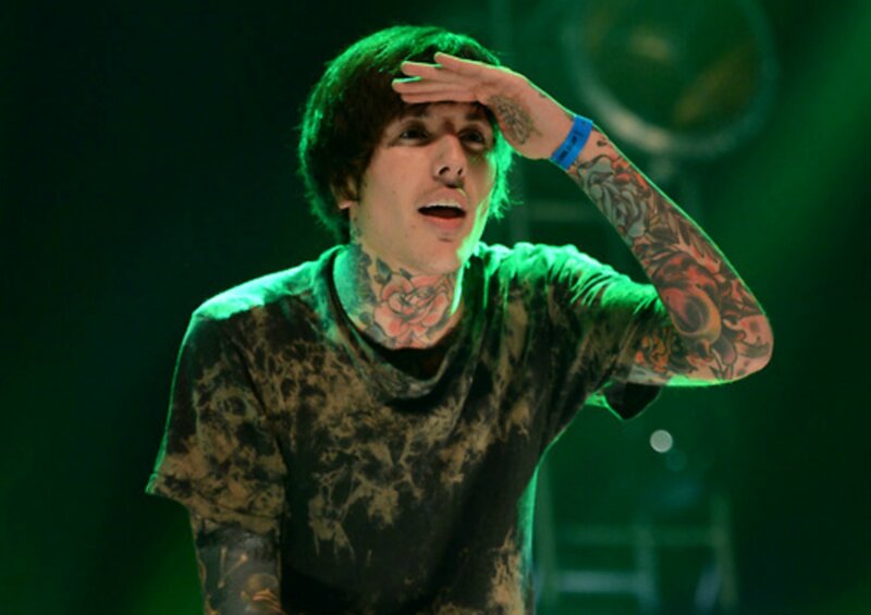Tattooed Man on Stage