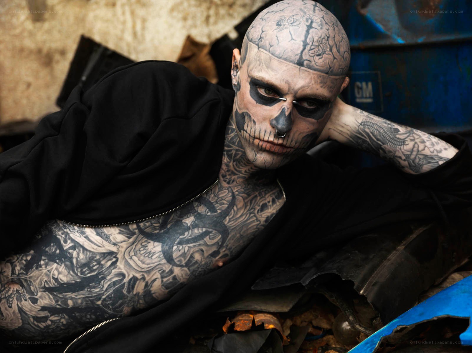 tattooed man with skull makeup