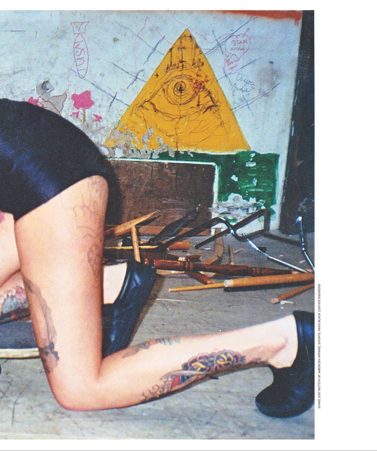 tattooed person in urban setting
