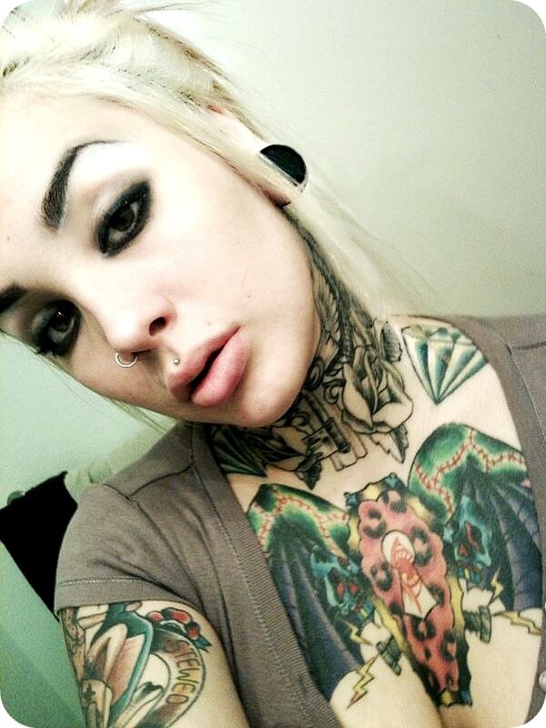 tattooed person with piercings