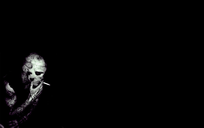 tattooed skull with cigarette