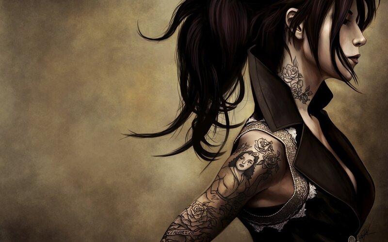 tattooed woman in profile