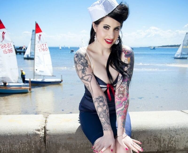 Tattooed Woman in Sailor Outfit